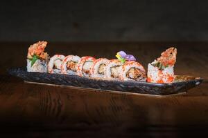 Savory set of sushi with tempura crab claws photo
