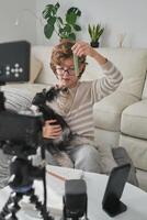 Boy shooting for blog with dog photo