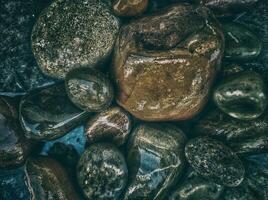 Rocks and stones in water photo
