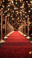 Red carpet event with golden stanchions and sparkling lights creating a glamorous atmosphere photo