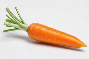 Single fresh carrot with green leaves lying on white background photo