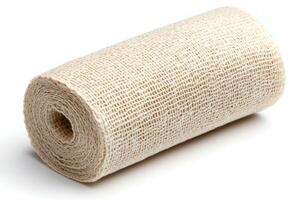 Medical gauze bandage roll lying on white background photo