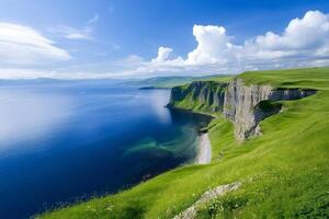 Cliffs of Moher rising above the blue Atlantic Ocean in County Clare, Ireland photo