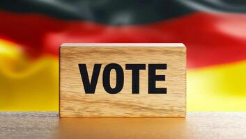 Importance of voting in Germany today. A wooden block displaying the word vote stands out against the German flag background, symbolizing civic engagement. photo