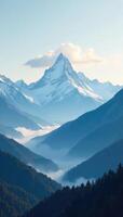 Snow-capped mountains with a misty atmosphere, cloudy, atmospheric, scenery photo
