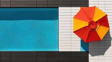 Summer Poolside Relaxation Colorful Umbrella by a Blue Swimming Pool photo