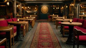 Rustic Wooden Pub Interior with Red Seating and Candles on Tables Elegant Red Carpet Leads to Bar photo