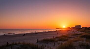 A beautiful sunset over the ocean and beach photo