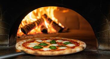 A pizza is being cooked in a brick oven photo