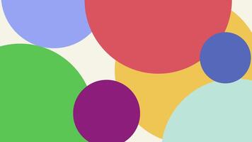 A vibrant pattern of overlapping circles in red, blue, green, and purple creates a playful and abstract design with soft gradients and smooth edges. video