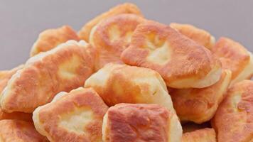 Homemade Fried Pies Spinning on Turntable Closeup Loopable video