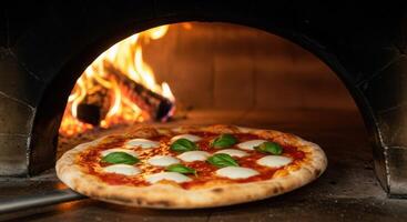 A pizza is being cooked in a wood burning oven photo