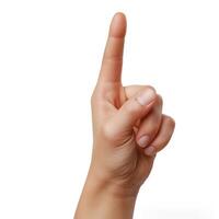 A close-up of a raised index finger, symbolizing a call for attention or emphasis. photo