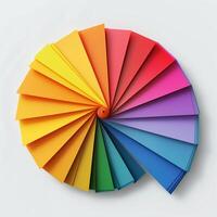 A vibrant display of color swatches arranged in a swirling pattern, showcasing a spectrum from yellow to purple. photo
