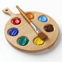 A wooden artist's palette featuring vibrant paint colors with a brush, perfect for creative expression. photo