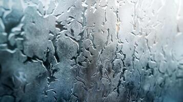 Close-up of intricate frost patterns on a glass surface, creating a beautiful abstract design. photo