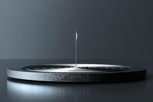 A close-up of a metallic needle piercing through a textured surface, creating ripples in the dark background. photo