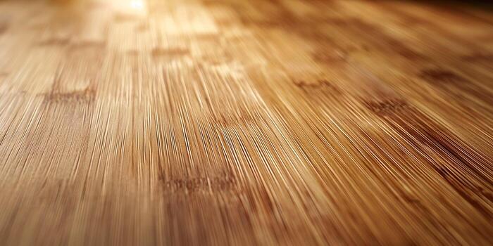 Close-up of a smooth bamboo surface, showcasing natural grains and textures that highlight its warmth and elegance. photo
