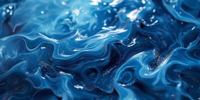 Flowing blue waves of glossy liquid shimmer in intricate patterns. photo