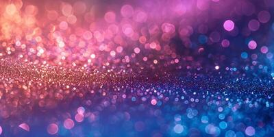A vibrant abstract background featuring shimmering bokeh lights in pink, purple, and blue tones. photo