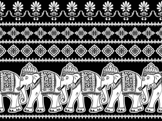 a black and white elephant pattern with ornate designs