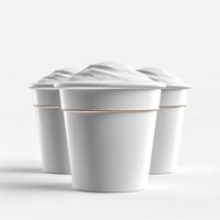 Three white paper cups filled with creamy ice cream, showcasing a simple and clean design. photo