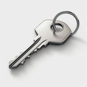 A close-up of a shiny metallic key with a ring, symbolizing security and access. photo
