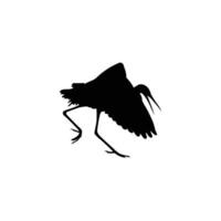 Silhouette of a heron jumping for prey vector