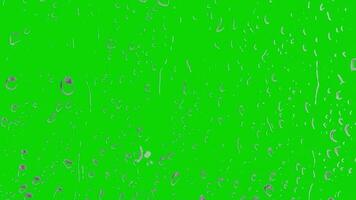Slow motion of water splashing with drops on green screen chroma key background video