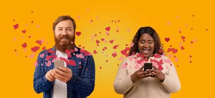 A couple enjoys a joyful moment on St. Valentine's Day, sharing affectionate messages through their smartphones. Hearts and colors create a festive atmosphere around them. photo