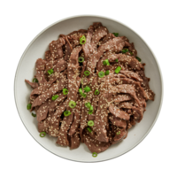 A bowl of sliced beef, sprinkled with sesame seeds and green onions isolated on transparent background png