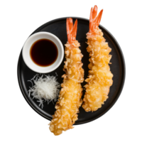 Crispy fried shrimp with dipping sauce and shredded garnish on a black plate isolated on transparent background png