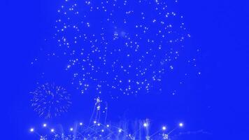 Abstract Real Firework on blue screen chroma key background, 4th of July independence day and new year eve 2024 concept. High quality 4k chromakey slow motion cinematic video