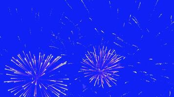 Abstract Real Firework on blue screen chroma key background, 4th of July independence day and new year eve 2025 concept. High quality 4k chromakey slow motion cinematic video
