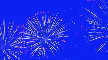 Abstract Real Firework on blue screen chroma key background, 4th of July independence day and new year eve 2025 concept. High quality 4k chromakey slow motion cinematic video