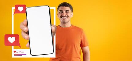 A social media influencer smiles while holding a smartphone. Speech bubbles with hearts appear beside the device, indicating interaction with followers on a bright yellow background. photo