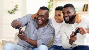 Three generations enjoy a gaming session in a comfortable living room, sharing laughter and excitement while playing together on the couch, creating cherished memories. photo