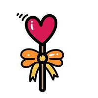 A heart shaped stick with a bow on it vector