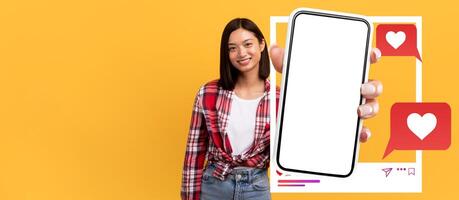 An influencer holds a smartphone with a blank screen against a vibrant yellow background. Chat bubbles and heart icons enhance the social media vibe, emphasizing online interaction. photo