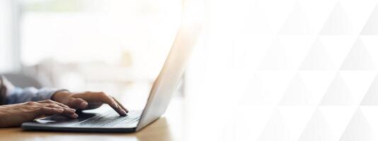 Woman typing on laptop at cafe, side view, freelance concept, cropped, copy space photo