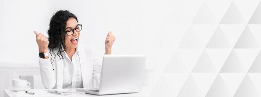 I Won. Cheerful mexican businesswoman celebrating success screaming with joy raising fists, copy space photo
