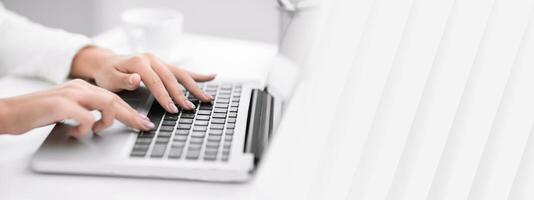 Job Search. Side view of unrecognizable lady using laptop, finding work projects online. Selective focus, empty space photo