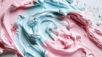A close up of a blue and pink frosting photo