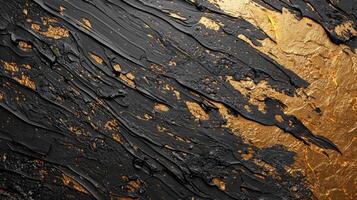 An abstract painting with gold paint on it photo