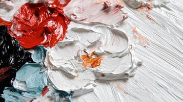 A close up of paint on a white surface photo