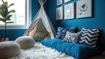 A blue room with a teepee and a rug photo