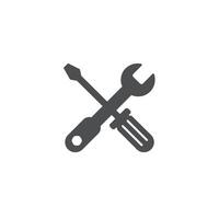 A wrench and a screwdriver icon on a white background vector
