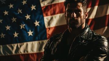 A man in leather jacket standing in front of an american flag photo