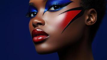 Beautiful african woman with red and blue makeup photo