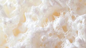 A close up of a soap bubble with white foam photo
